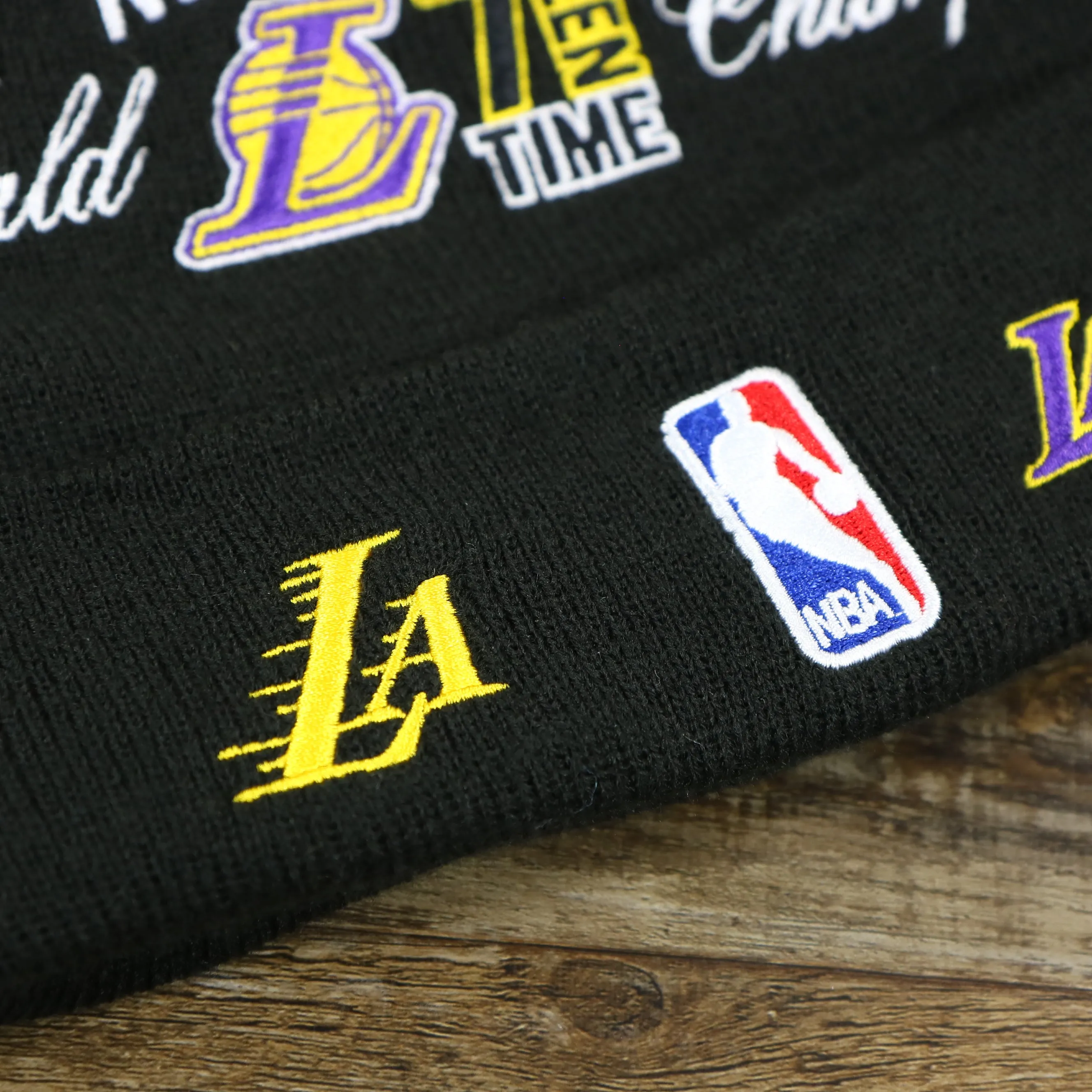 Los Angeles Lakers All Over NBA Finals Side Patch 17x Champion Knit Cuff Beanie | New Era, Black